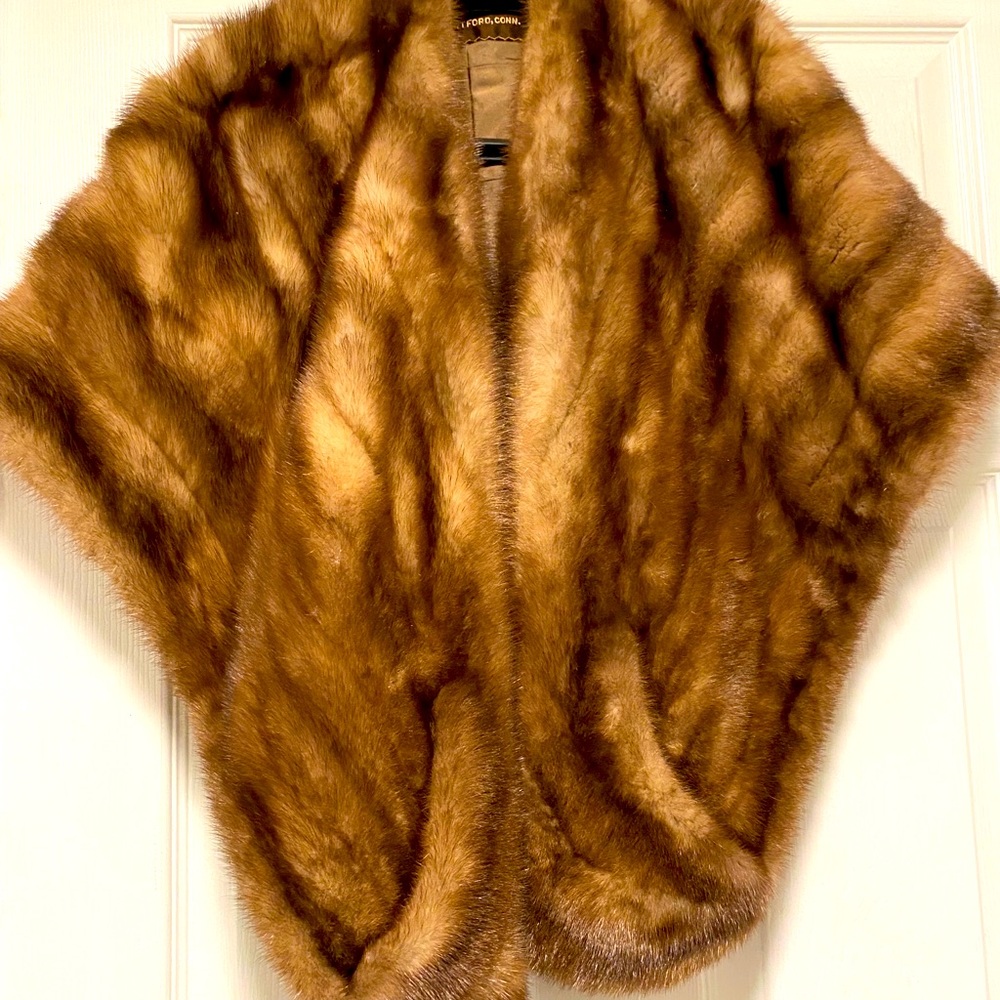 Vintage fur/ mink shall with pockets
Over 50 years old